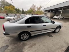 Сүрөт унаа Mitsubishi Carisma