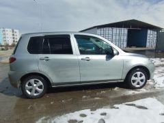 Photo of the vehicle Mazda Demio