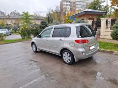 Фото авто Mazda Demio