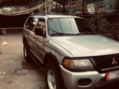 Сүрөт унаа Mitsubishi Montero Sport