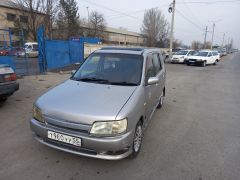 Сүрөт унаа Nissan Cube