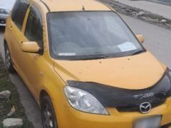 Сүрөт унаа Mazda Demio