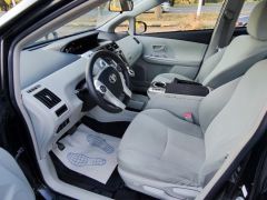 Фото авто Toyota Prius v (+)