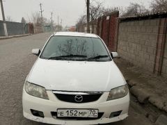 Фото авто Mazda Familia