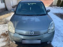 Photo of the vehicle Mazda Demio