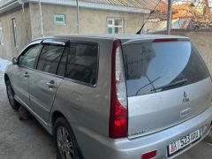 Фото авто Mitsubishi Lancer