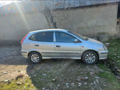 Фото авто Nissan Almera Tino