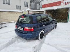 Фото авто Kia Carens