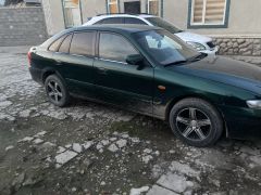 Фото авто Mazda 626