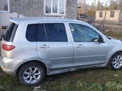 Photo of the vehicle Mazda Demio