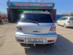 Сүрөт унаа Mitsubishi Outlander