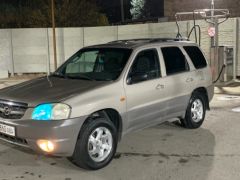 Photo of the vehicle Mazda Tribute