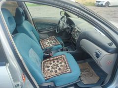 Photo of the vehicle Nissan Almera