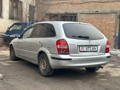 Фото авто Mazda 323