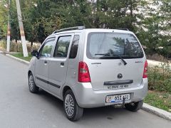 Photo of the vehicle Suzuki Wagon R+