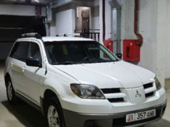 Фото авто Mitsubishi Outlander