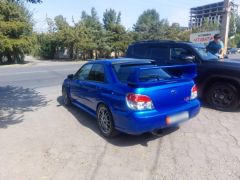 Photo of the vehicle Subaru Impreza WRX STi