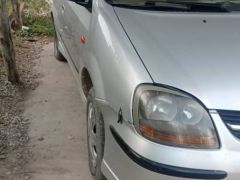 Photo of the vehicle Nissan Almera Tino