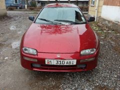 Сүрөт унаа Mazda 323