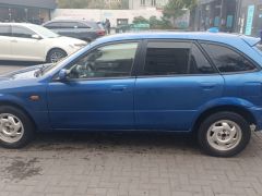 Фото авто Mazda 323