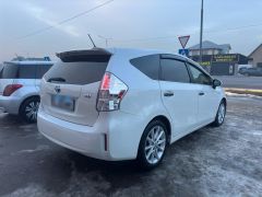 Photo of the vehicle Toyota Prius v (+)