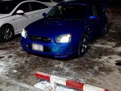 Photo of the vehicle Subaru Impreza WRX STi