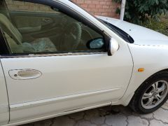 Photo of the vehicle Nissan Cefiro