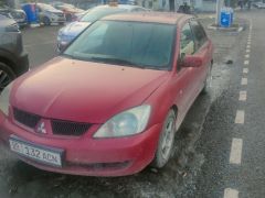 Фото авто Mitsubishi Lancer