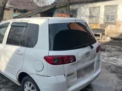 Photo of the vehicle Mazda Demio