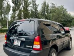 Photo of the vehicle Mazda Tribute