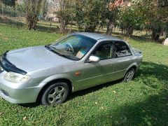 Фото авто Mazda Familia