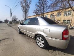 Фото авто Mazda 323