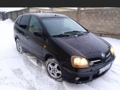 Фото авто Nissan Almera Tino