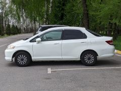Photo of the vehicle Honda Fit Aria