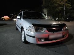 Сүрөт унаа Mazda 323