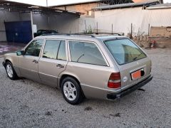 Сүрөт унаа Mercedes-Benz W124