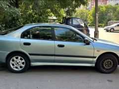 Сүрөт унаа Mitsubishi Carisma