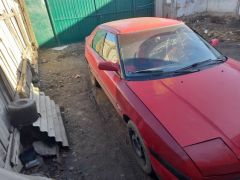 Сүрөт унаа Mazda 323