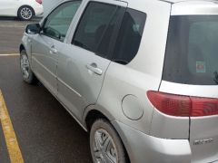 Photo of the vehicle Mazda Demio