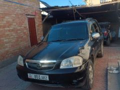 Photo of the vehicle Mazda Tribute