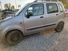 Photo of the vehicle Suzuki Wagon R+