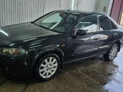 Photo of the vehicle Nissan Almera