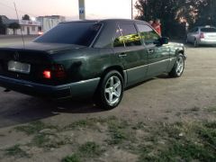 Сүрөт унаа Mercedes-Benz W124