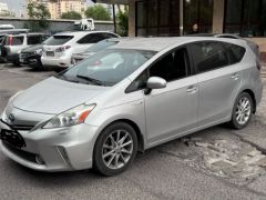 Photo of the vehicle Toyota Prius v (+)