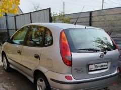 Фото авто Nissan Almera Tino