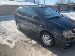 Фото авто Nissan Almera Tino