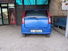 Photo of the vehicle Daihatsu Cuore