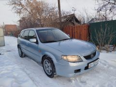 Фото авто Mazda 323