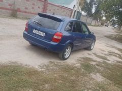 Фото авто Mazda Familia