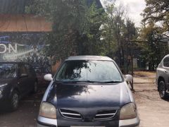 Фото авто Nissan Almera Tino